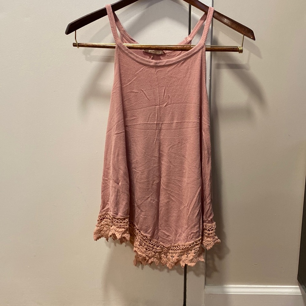 Large, pink rose, tank top with embroidery all the way around the bottom